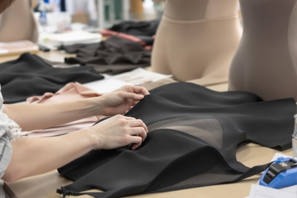 Visual inspection of a black shapewear product